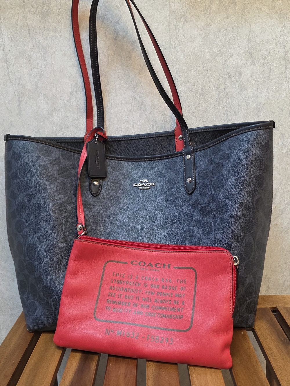Coach Women’s Black Signature Tote with Red Pouch